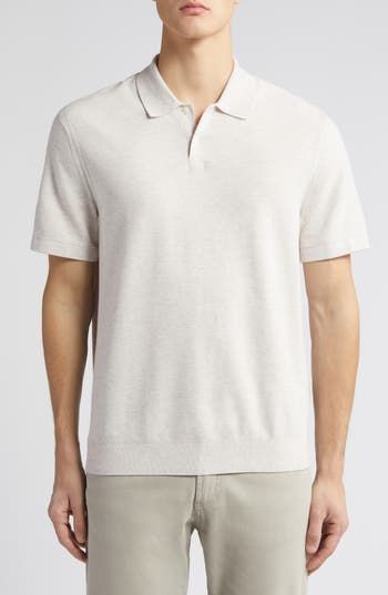 This work-to-weekend polo is crafted in a soft shape-retaining knit for season-spanning polish. 26 1/2" length ( size Medium) Button half-placket Short sleeves 60% viscose, 36% thermoplastic polyester, 4% other fibers Machine wash, dry flat Imported Classic Beige Polo Sweater With Collar, Classic Cream Tops For Business Casual, Classic Cream Top For Business Casual, Classic Beige Polo Shirt With Collared Neckline, Casual Beige Polo Sweater With Polo Collar, Classic Knit Polo Sweater With Short Sleeves, Classic Cream Top With Spread Collar, Classic Beige Polo Shirt With Johnny Collar, Classic White Collared Polo Sweater