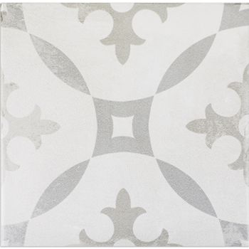 a white and grey tile with an intricate design