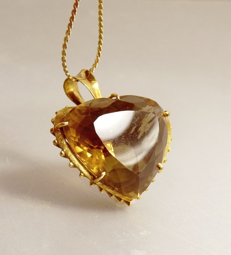 "Large 14K Gold Smoky Topaz Quartz Heart Pendant Vintage Jewelry Amazing, Large, Vintage Heart Pendant 14K Yellow Gold, High Basket Prong Setting, With Vertical Supports This Unique, Elegant Pendant Measures 1 1/4\" W x 1/8\" High  Not Including The Bail, 1.5\" With The Bail x 7/8\" Depth It Is Hallmarked For Gold On The Bail, But Unreadable As  To Maker Or Content Chain Is For Photos Only The Chain Is Not Included ! Jeweler Tested At 14K  Total Weight 17.5 Grams  jujubee1.etsy.com  To Browse My Antique Yellow Gold Heart Cut Jewelry, Heirloom Heart Cut Gemstone Jewelry, Heart Cut Topaz Jewelry For Anniversary, Antique Heart Cut Jewelry For Formal Occasions, Heart Cut Topaz Gemstone Jewelry, Heart Cut Topaz Jewelry Gift, Heart Cut Topaz Jewelry As Gift, Heart Cut Topaz Jewelry Perfect For Gifts, Heart Cut Topaz Jewelry For Gifts