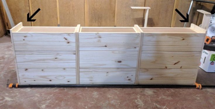 the unfinished drawers are being assembled and ready to be used as an office desk or storage unit