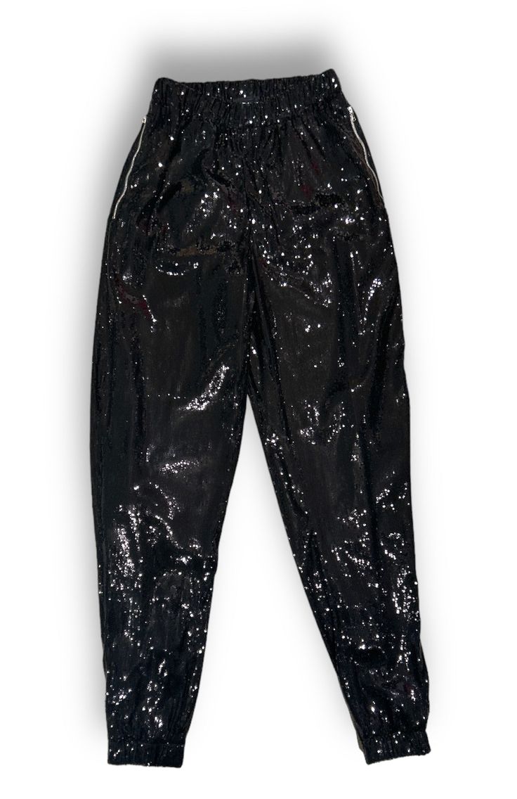 Steven Davis created these fabulous pants with zippered pockets, a full lining, and a fully elastic waistband. They're the perfect choice for adding some disco to your daytime look and elevating your wardrobe game! Fits Size M Stretch Pants With Zipper Closure For Night Out, Trendy Stretch Pants With Sequins, Black Stretch Disco Bottoms, Trendy Shiny Pants For Night Out, Spring Night Out Pants With Zipper Closure, Black Disco Bottoms For Night Out, Disco Style Black Bottoms For Night Out, Trendy Shiny Bottoms For Party, Trendy Shiny Party Bottoms