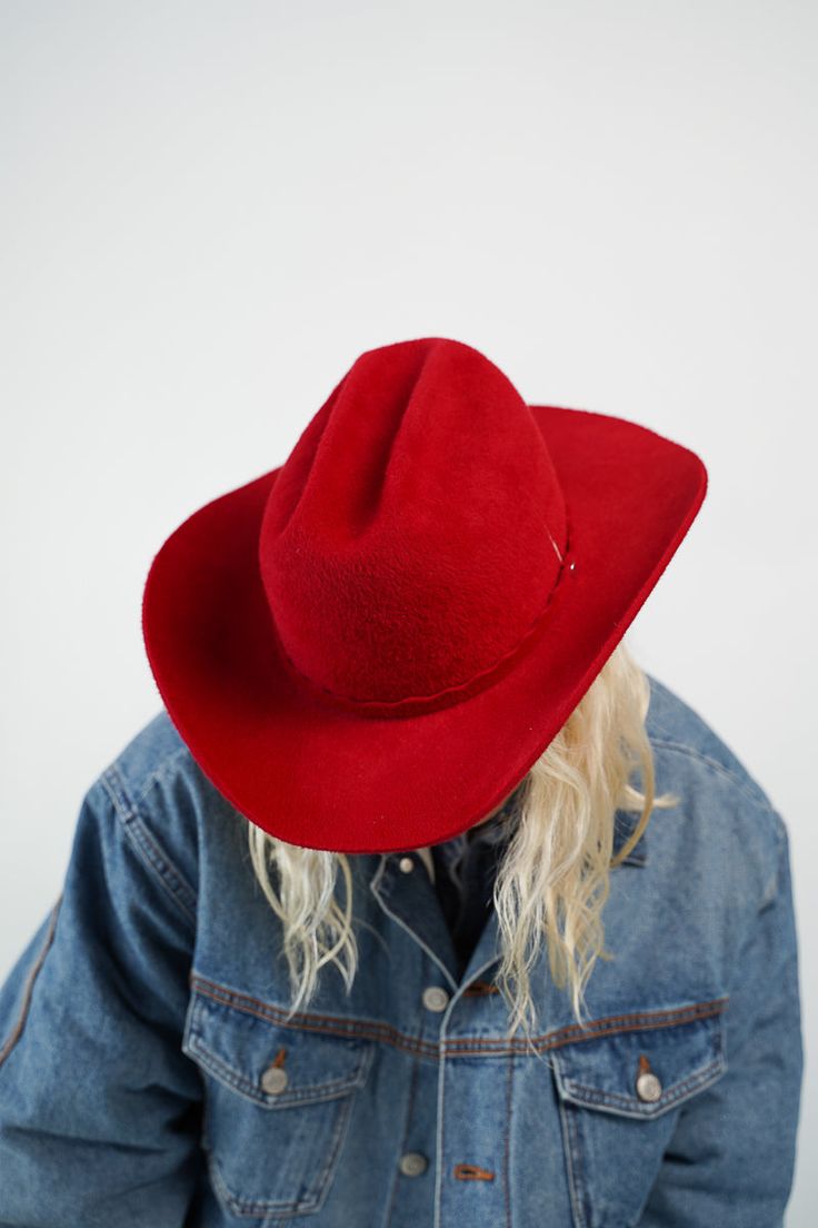 This updated version of our Vision cowboy style features a self-fabric band with a scalloped edge, sealed with a round silver stud. Still made with a center crease, and a flanged brim. Each hat is carefully crafted by hand in our Stockholm studio. Western Red Felt Hat For Winter, Western Style Red Felt Hat For Winter, Western Red Hat Bands For Winter, Red Western Hat With Short Brim, Red Western Hat Bands For Winter, Fitted Red Western Felt Hat, Western Style Red Hat Bands For Winter, Red Western Hat For Fall, Classic Red Felt Hat For Fall