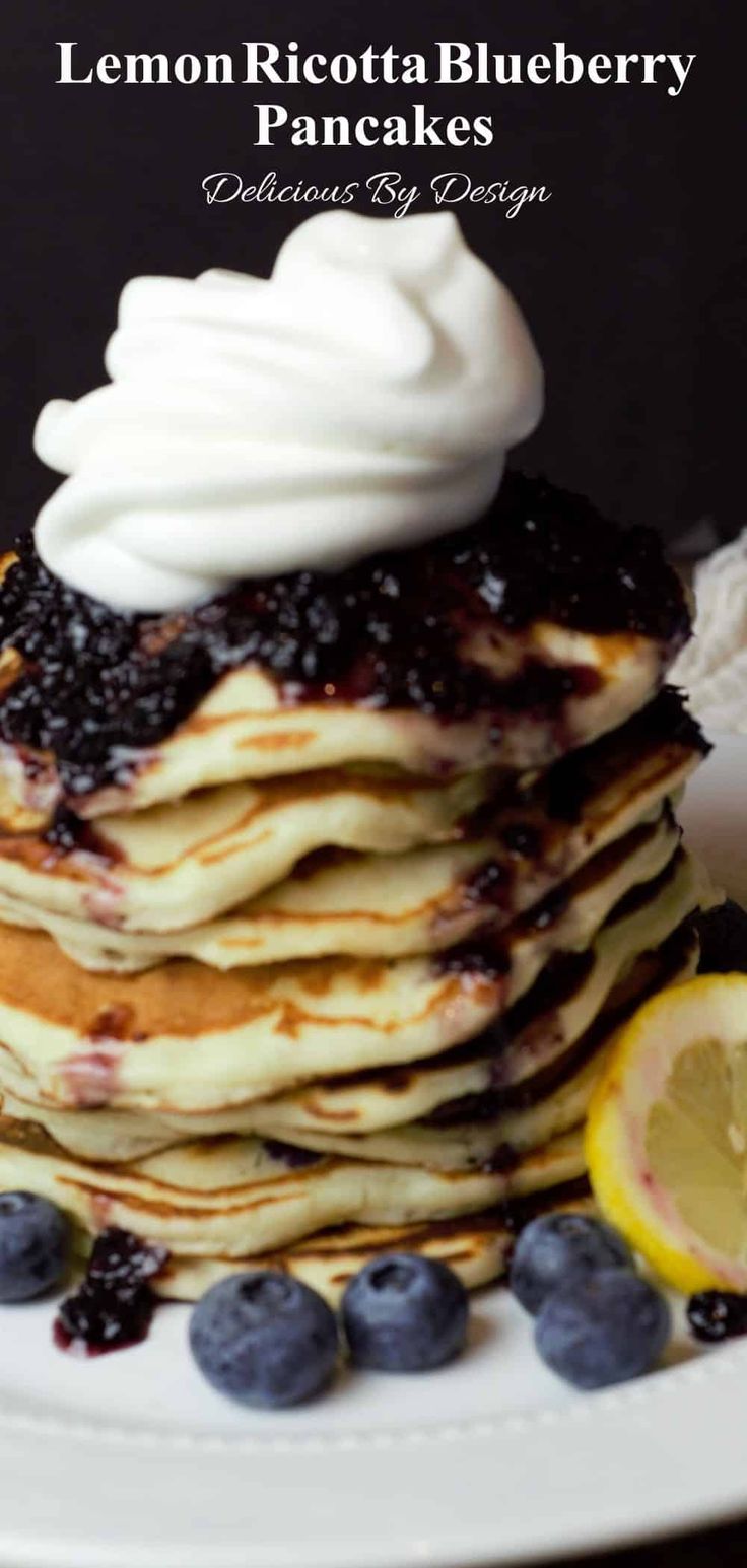 lemon ricotta blueberry pancakes with whipped cream