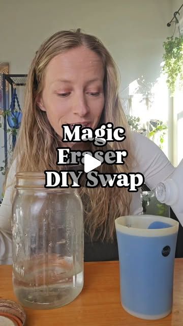 a woman sitting at a table in front of a glass jar with liquid inside and the words magic eraser diy swap