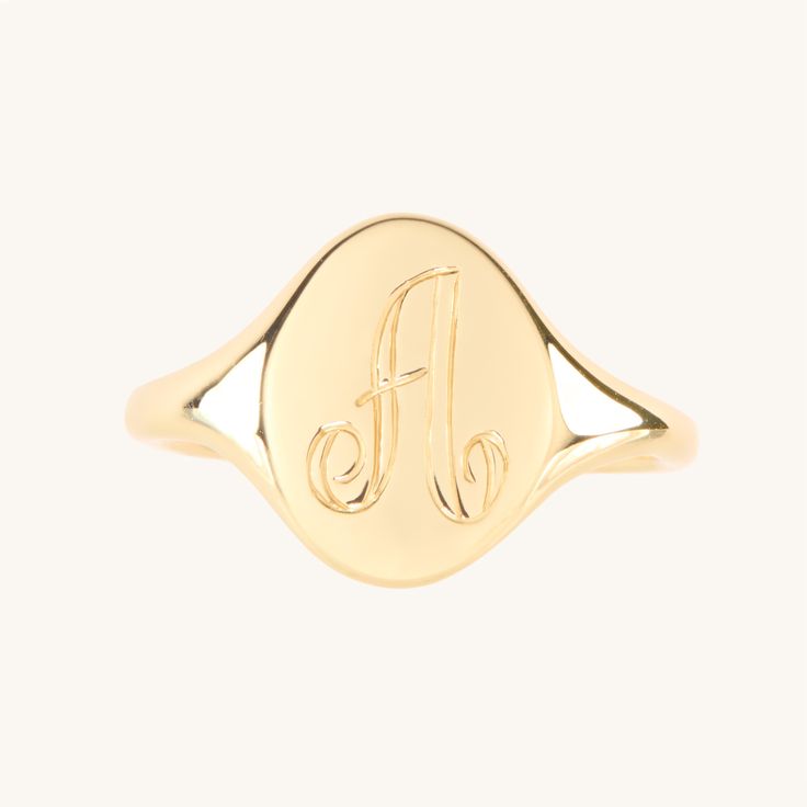 A perfectly proportioned, classic signet ring, scaled especially well for a pinkie finger. A true wear-for-forever piece.Looking for this ring in a size larger than 6? We suggest the Large Heirloom Signet Ring, which has a slightly thicker band better suited for this size range. Elegant Personalized Round Cut Rings, Elegant Personalized Open Stackable Rings, Elegant Round Band Signet Ring For Anniversary, Luxury Oval 14k Stamped Signet Ring, White Gold Elegant Signet Ring, Luxury Oval Stackable Promise Rings, Luxury Round Signet Ring For Promises, Elegant Personalized Round Band Ring, Timeless Oval Dome Ring Stamped 14k