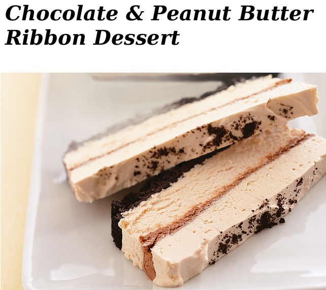 two pieces of cake on a plate with chocolate shavings and white frosting