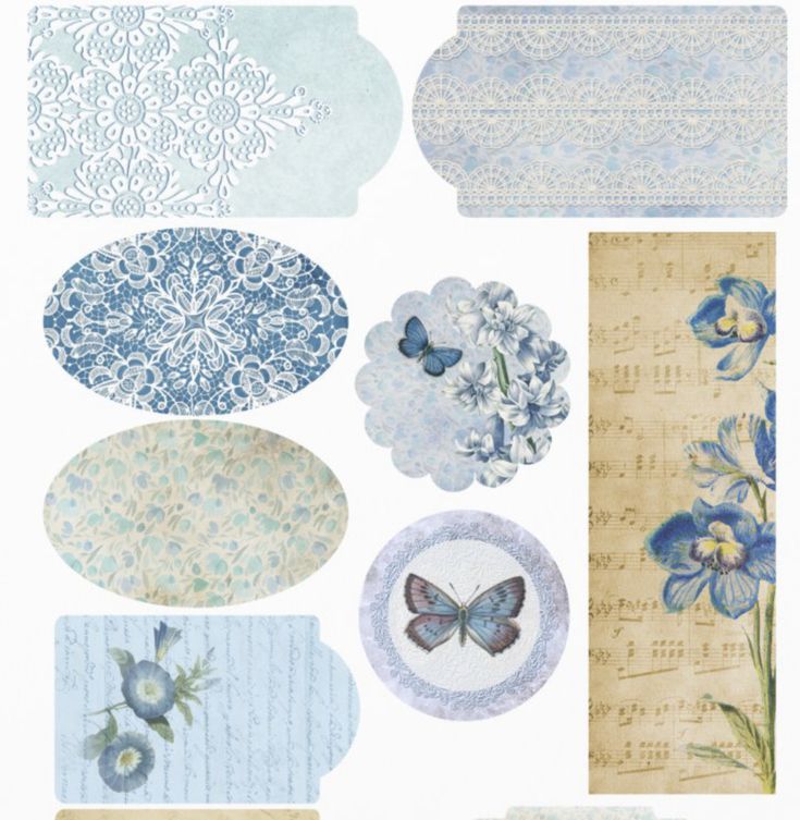 blue flowers and butterflies are arranged on paper