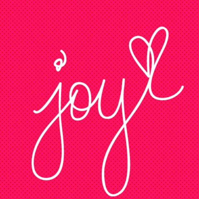 the word joy written in cursive writing on a pink background with white lines