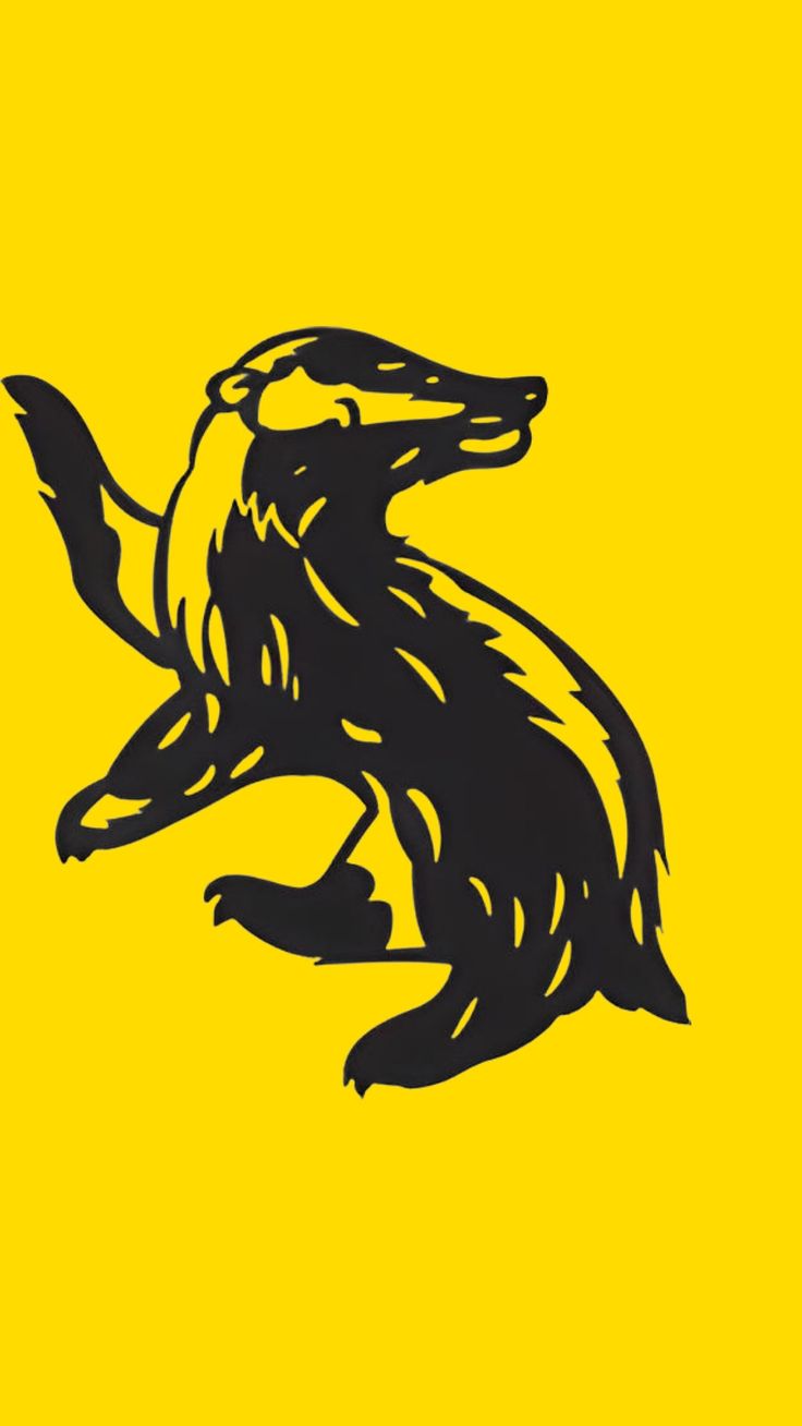 an animal that is standing up against a yellow background