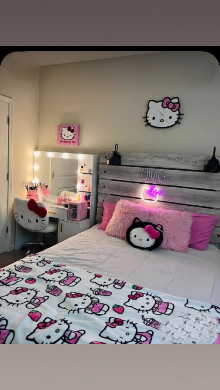 a hello kitty themed bedroom with pink and white decor