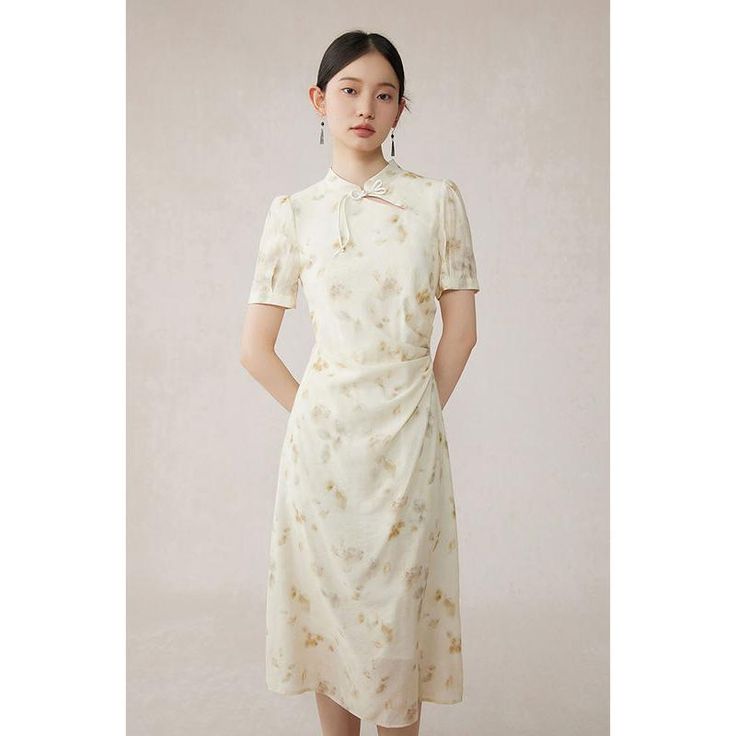 Discover Elegance with a Modern Twist Step into the summer with a blend of tradition and contemporary fashion. Our Floral Embroidered Cheongsam Dress is designed for women who appreciate elegance with a modern flair. Crafted from high-quality polyester, this dress promises comfort and durability, making it a staple for your summer wardrobe. Product Features This Cheongsam dress features a sophisticated straight silhouette that flatters any body type, enhanced with exquisite floral embroidery that adds a touch of luxury. The mid-calf length is perfect for both casual and formal occasions, while the short sleeves and unique neckline provide a comfortable and stylish fit. Material: 100% Polyester for lasting wear Design: Elegant floral embroidery for a luxurious look Fit: Regular fit with a s Elegant Embroidered Cheongsam For Spring, Elegant Fitted Cheongsam With Floral Print, Elegant Embroidered Ao Dai For Summer, Elegant Ao Dai With Floral Embroidery For Spring, Feminine Summer Floral Print Embroidered Dress, Elegant Floral Embroidered Ao Dai For Summer, Elegant Fitted Silk Summer Dress, Fitted Elegant Silk Dress For Summer, Elegant Fitted Silk Dress For Summer