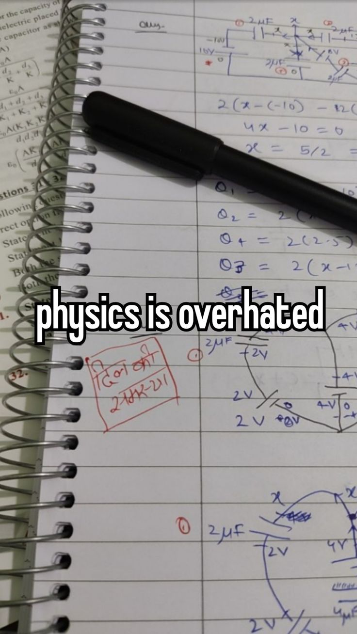 an open notebook with the words physics is overrated