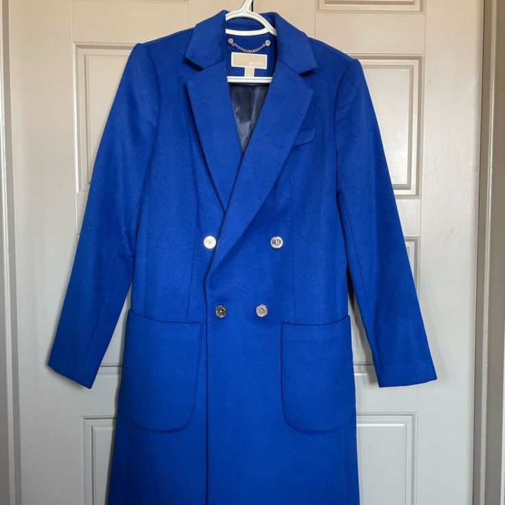 Beautiful Blue Coat Size 2. Used Just Once. I Really Love This Coat But I’m 5’0” And The Coat Is Too Long For Me. In Perfect Condition, Like New!! If You Are Interested, You Can Make An Offer !! Chic Blue Business Outerwear, Blue Fitted Outerwear With Double Button Closure, Fitted Blue Outerwear With Double Button Closure, Career Blue Buttoned Outerwear, Career Blue Outerwear With Buttons, Blue Buttoned Career Outerwear, Tailored Blue Long Coat, Tailored Long Blue Coat, Royal Blue Winter Outerwear For Work