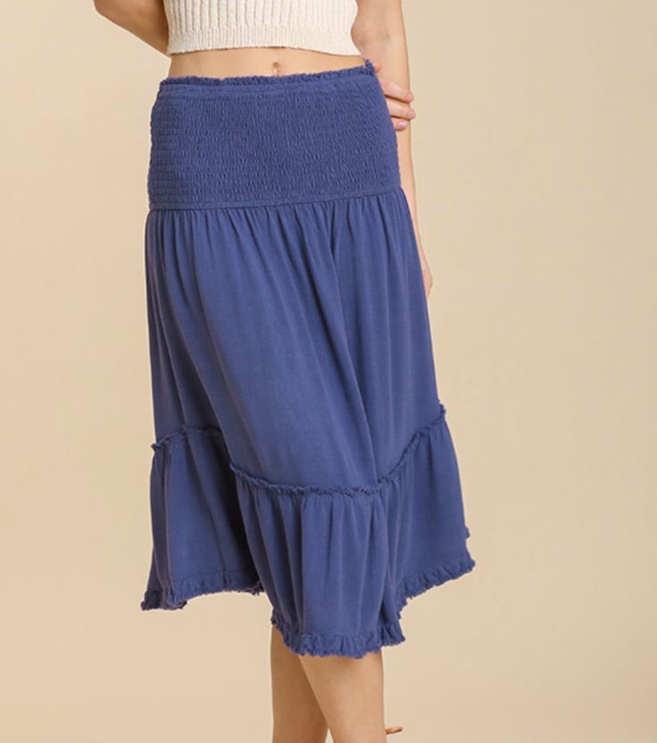 Turn heads in the versatile Loxley Strapless Dress, made with a linen blend for lightweight comfort. The smocked top and ruffle hem add feminine flair, while the denim blue color adds a playful touch. Wear it as a dress or skirt, perfect for any occasion. Casual Cotton Smocked Dress For Summer, Blue Bottoms With Smocked Bodice For Summer, Casual Smocked Stretch Dress, Blue Smocked Tiered Skirt Dress For Summer, Casual Stretch Smocked Dress With Ruffles, Blue Tiered Skirt Smocked Dress For Summer, Blue Smocked Dress With Tiered Skirt, Breezy Smocked Dress For Spring, Spring Cotton Smocked Dress With Tiered Skirt