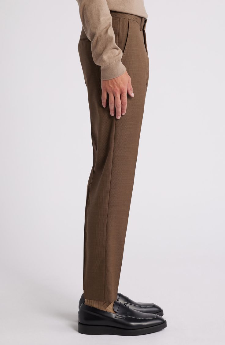 Tailored from subtly patterned wool, these all-occasion dress pants feature classic flat-front styling and a mid-rise fit that stays slim through the legs. 30 1/2" inseam; 13" leg opening; 10" front rise; 15 1/2" back rise (size 48EU) Zip fly with hook-and-bar closure Front slant pockets; back welt pockets Partially lined Unhemmed 100% wool Dry clean Imported Brown Slim Fit Dress Pants For Fall, Brown Wool Formal Pants, Formal Brown Wool Pants, Elegant Dress Pants With Straight Hem For Office, Elegant Tailored Brown Bottoms, Brown Straight Leg Dress Pants For Business Casual, Brown Flat Front Dress Pants For Fall, Elegant Brown Straight Leg Pants, Tailored Brown Pants With Pressed Crease