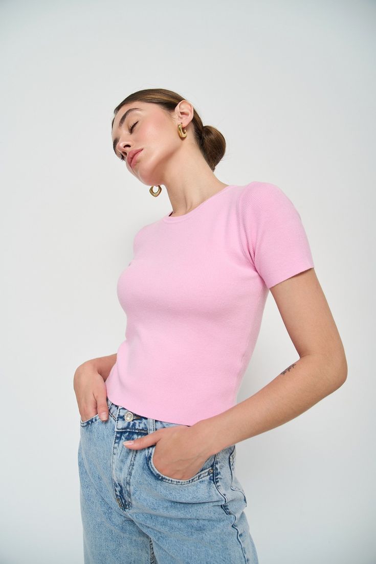 This pink knit T-Shirt is an unusual accent for your summer looks. The fabric and texture create an interesting and voluminous look, making it a stylish alternative to a plain T-Shirt. Pair it with casual pieces like light blue jeans, or style it with white pants for more formal events. Casual Pieces, Plain T Shirt, Pink Knit, Light Blue Jeans, Short Sleeve Sweater, Top Pants Set, Sweater Tank Top, Knitted Tshirt, Pink Shorts