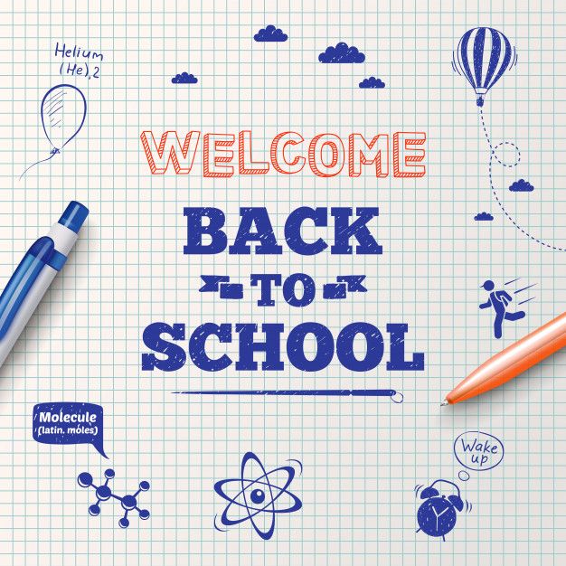 welcome back to school written on a piece of paper with marker and pencil stock photo