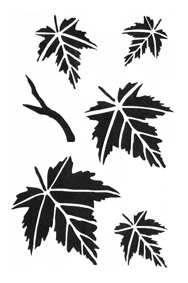 four leaf stencils are shown in black and white, each with different shapes