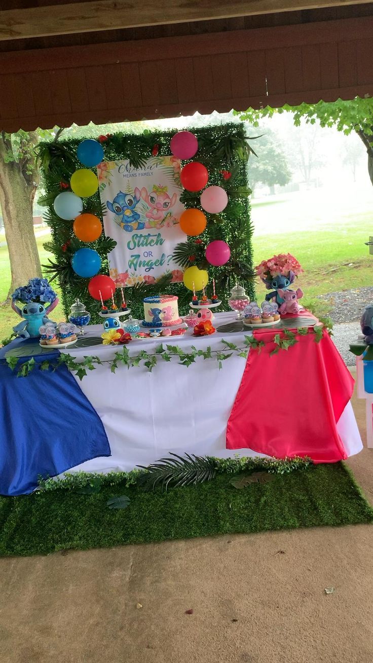 a table set up for a birthday party