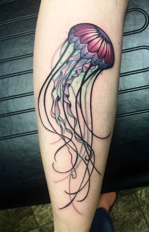 a tattoo with a jellyfish on it