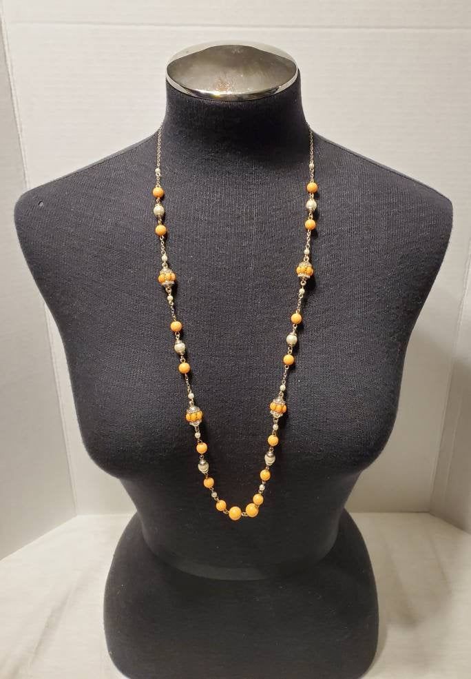 Banana Republic Beaded Necklace - Excellent Condition - coral colored beads - signed - see pictures for more details Orange Costume Jewelry Necklace For Party, Orange Necklaces With Large Beads For Party, Orange Party Necklaces With Large Beads, Orange Beaded Costume Jewelry Necklaces, Vintage Orange Beaded Chain Necklace, Vintage Orange Beaded Necklace, Orange Large Beaded Jewelry For Party, Coral Beaded Necklaces With Large Beads, Orange Polished Beads Necklace