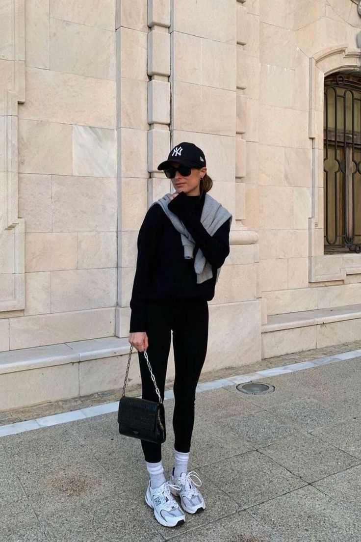 Hat, leggings, new balance, all black New Balance Tennis Shoes Outfit, Fall Soccer Game Outfit, Nike Initiator Women Outfit, Nike New Balance Outfit, Adidas Samba Outfit Ideas, November Nyc Outfits, City Walking Outfit, Vomero 5 Outfit Woman, City Exploring Outfit