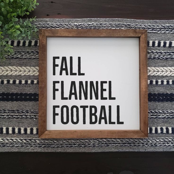 a framed sign that says fall flannel football