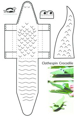 the paper doll is cut out and ready to be made into a crocodile costume for children