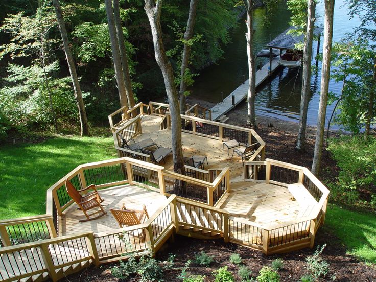 an aerial view of a deck and dock in the woods