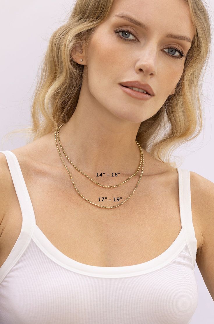 An MF favorite, the London is a 3mm diamond cut beaded chain that can be worn on it's own or to complete any look! 18k gold-plated sterling silver 3mm beads Available in 2 lengths 14k Gold Single Strand Jewelry With Round Beads, Everyday 14k Gold Round Beads Necklace, Classic Single Strand Necklace With Round Beads, Classic Single Strand Chain Necklace With Round Beads, Minimalist Everyday Jewelry With Ball Chain, Gold Plated Chain Necklace With Round Beads, Gold Plated Round Beads Chain Necklace, Everyday Minimalist Jewelry With Ball Chain, Everyday Minimalist Ball Chain Jewelry