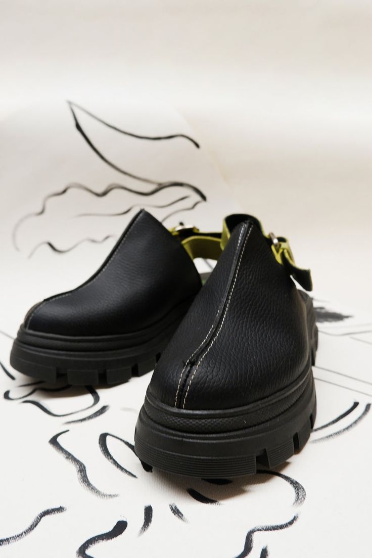 Introducing our boldest addition to the Insignia Dsgn family. Made with premium leather, these clogs are designed to provide style and functionality. They come in a classic black color, making them versatile and easy to pair with any outfit. The chunky sole provides a sturdy and durable base, adding a modern touch to t Color Making, Chic Shoes, Aesthetic Shoes, Mood Board Fashion, Comfy Shoes, Beautiful Shoes, Metal Buckles, Natural Leather, Cute Shoes