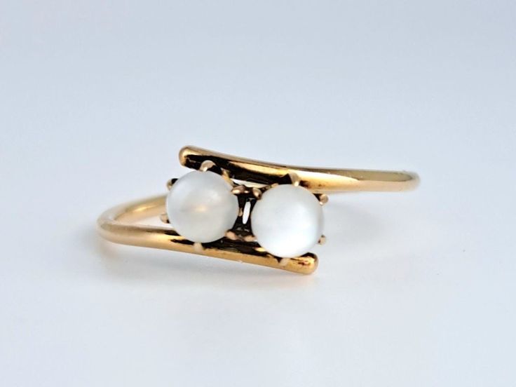 Beautiful antique natural moonstone ring in 10K yellow gold from the Victorian era. This very romantic ring features two round natural moonstone orbs in a lovely toi et moi setting. The toi et moi setting rose in popularity following Napolean's engagmement to his beloved Josphine. The moonstone orbs are in excellent condition and measure 3.7mm each. Ring size 5 3/4 and easily sized up or down several sizes.  Ring sizing service available; please see sizing fees listed below. Please allow one wee Romantic Rings, Moonstone Ring, Victorian Era, Makers Mark, Moonstone, Favorite Jewelry, Patina, Platinum, Jewelry Rings