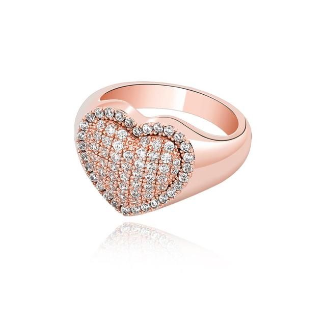 Iced out heart design statement ring with AAA cubic zirconia pave inlay. A stunning piece that really shines! Available in rose gold, gold, and silver colors. Details Item Type: Fashion Rings Metal Type: Copper+Gold Plated Size: 15mm*23mm Main Stone: AAA Cubic Zirconia Accessory Stone: AAA Cubic Zirconia Rock Rings, Diamond Ice, Diamond Heart Ring, Heart Shaped Rings, Ring Shapes, Pave Ring, Copper Rings, Delicate Jewelry, Cz Ring