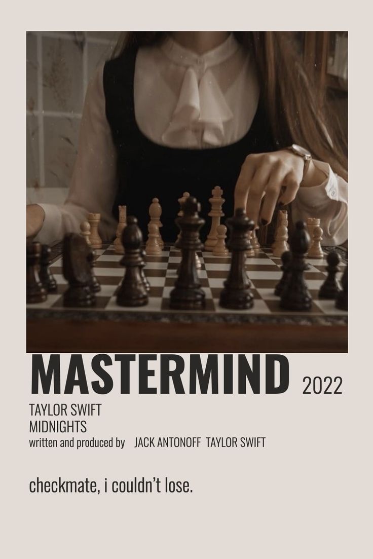 a woman is playing chess in front of a poster