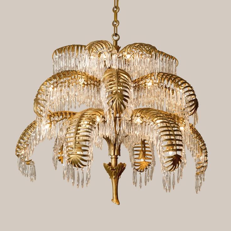 a gold chandelier hanging from the ceiling