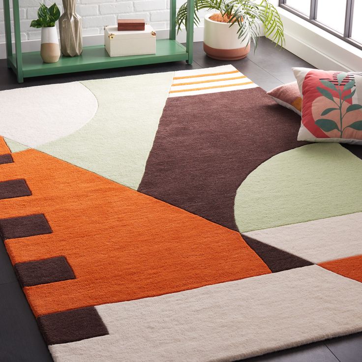 an area rug with various colors and shapes