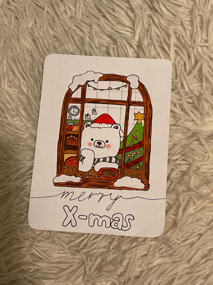 a christmas card with a polar bear looking out the window and santa hat on it