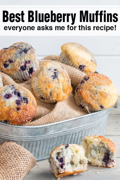 blueberry muffins in a metal pan with the words, best blueberry muffins everyone asks me for this recipe