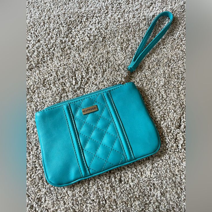 Nwot Turquoise Wristlet. Never Used. From Smoke And Pet Free Home. Blue Rectangular Wristlet For Everyday Use, Everyday Blue Pouch Wristlet, Blue Bags With Wrist Strap For Daily Use, Blue Wristlet With Zipper Pouch For Daily Use, Blue Wristlet With Zipper Pouch For Travel, Blue Clutch Wristlet For Travel, Blue Rectangular Wristlet With Zipper, Blue Rectangular Bag With Wrist Strap, Blue Rectangular Wristlet With Zipper Pouch