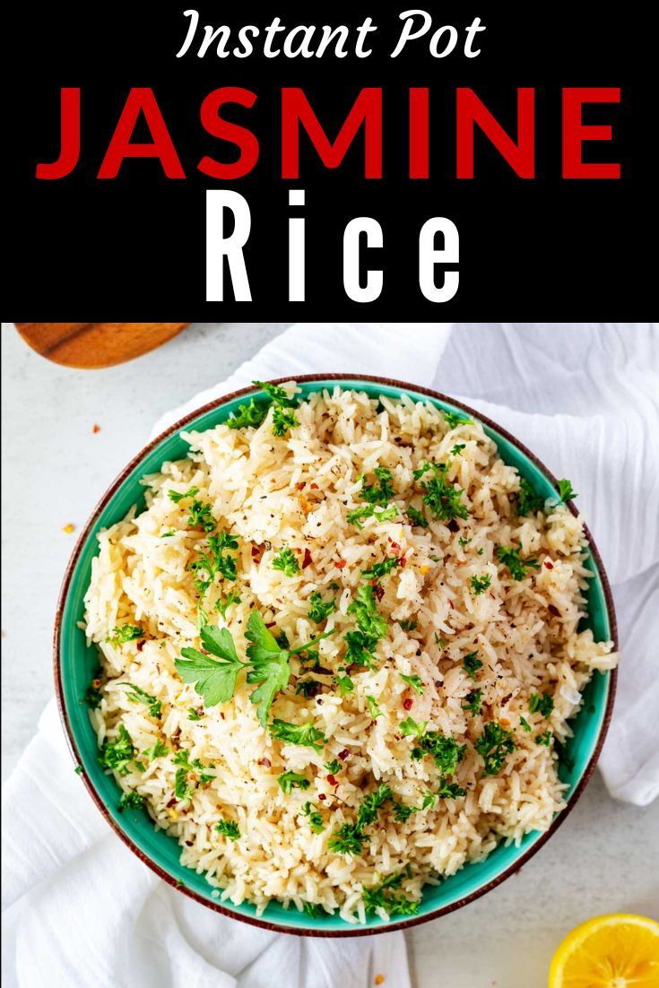 a bowl filled with rice and garnished with parsley