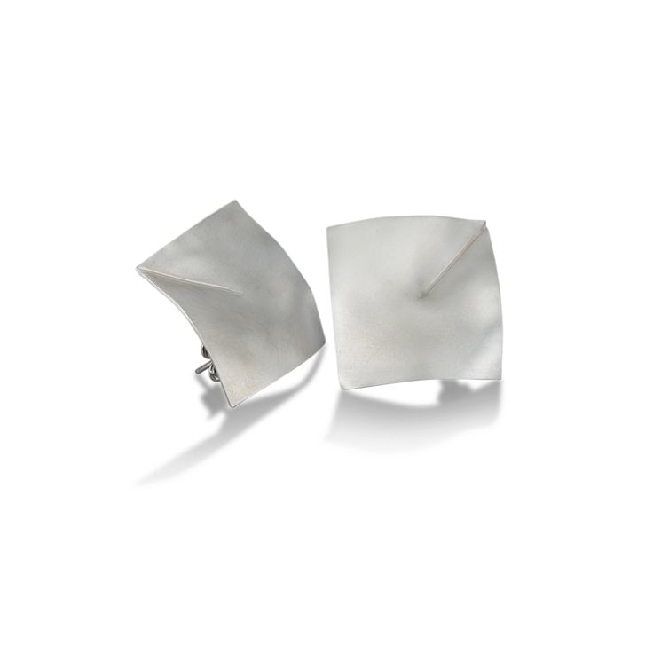 Silver Earrings - Using fine silver, the artist translates the delicate beauty of origami into sculptural earrings that delight the eye with their dimensional design and luminous brushed finish. Sterling silver posts. Modern White Gold Clip-on Earrings As Gift, Modern Sterling Silver Clip-on Earrings For Formal Occasions, Contemporary Polished Finish Earrings As Gift, Modern Earrings With Polished Finish As Gift, Modern Earrings With Polished Finish For Gift, Modern Polished Earrings For Gifts, Modern Clip-on Earrings With Polished Finish, Modern Polished Clip-on Earrings As Gift, Modern Polished Clip-on Earrings For Gift