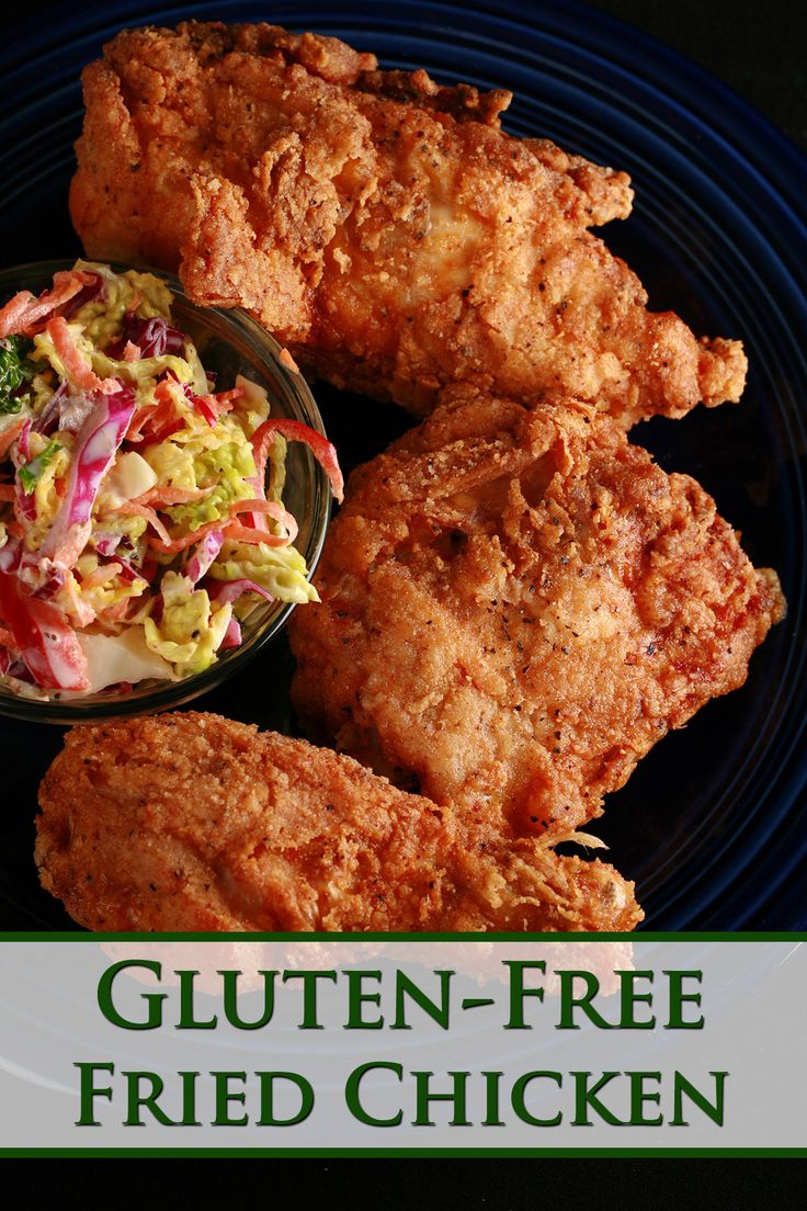 fried chicken on a plate with coleslaw and slaw in a bowl next to the words gluten - free fried chicken