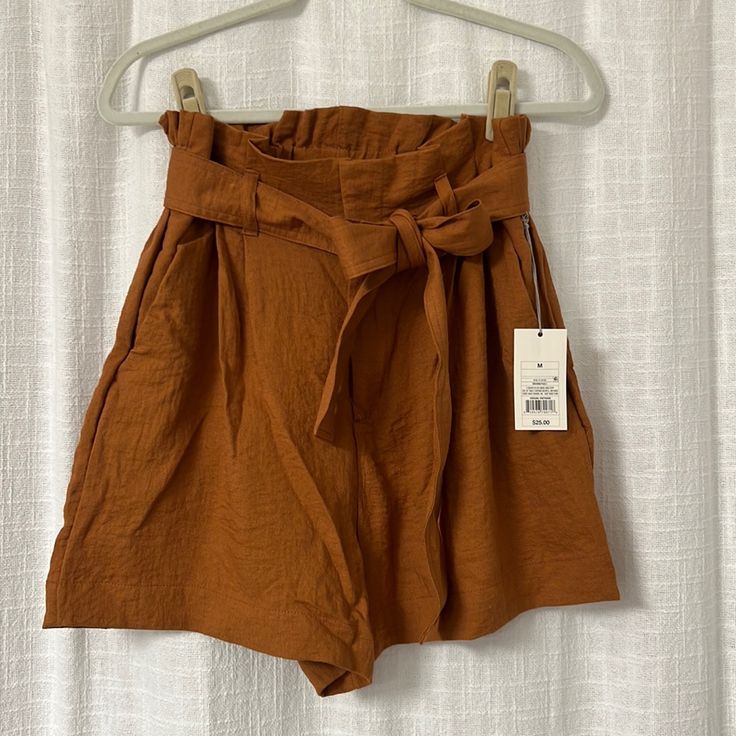 These Are Light Weight High Waisted Burnt Orange Shirts. Comes With Tie. Has Pockets In The Front And Fake Pockets In The Back. Great Paired With A Bodysuit Or Cropped Top! Brown Bottoms For Summer Daywear, Brown Summer Bottoms For Daywear, Summer Daywear Brown Bottoms, Brown Summer Daywear Bottoms, Hot Pink Shorts, Summer Fashion For Teens, Dressy Shorts, Leopard Print Shorts, Seersucker Shorts