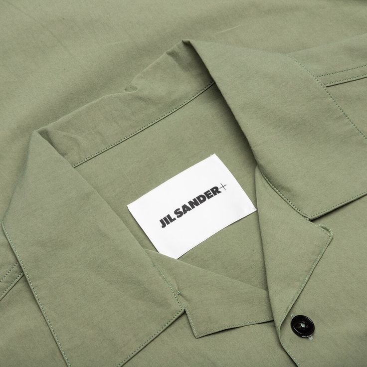 The Jil Sander Shirt is a must-have apparel silhouette for any rotation. Taking on a cotton construction, the silhouette features a button-down closure and a spread collar for a finishing touch. 100% cotton Spread collar Button-down closure Style No: J47DL0106-J45127-319 Casual Cotton Camp Shirt With Lapel Collar, Cotton Camp Shirt With Lapel Collar And Pockets, Classic Camp Shirt With Lapel Collar For Spring, Modern Button-up Shirt With Placket, Cotton Camp Shirt With Placket, Summer Cotton Camp Shirt For Workwear, Summer Cotton Camp Shirt For Work, Cotton Camp Shirt With Johnny Collar, Classic Camp Shirt With Spread Collar For Spring