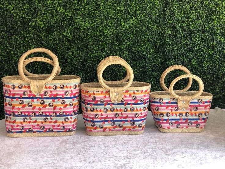 Beautiful hand-woven bag made with natural Palm leaf. Artisanal Palm leaf handmade handbags. Frida Kahlo tote bag. Sets of 3 small, medium and Large. Purchase sets or individual. Aprx Dimensions Small Bag. $19.98Length: 12.5”Height: 12”Width: 5.6” Medium Bag $24.98Length: 14.5”Height: 14”Width: 6” Large Bag $29.98Length: 16.5”Height: 17.5”Width: 6.3” Top Handle Straw Bag As Gift, Top Handle Straw Bag For Gifts, Top Handle Natural Straw Bag As Gift, Top Handle Natural Straw Bag For Gift, Natural Top Handle Straw Bag As Gift, Rectangular Woven Bucket Bag As Gift, Eco-friendly Handmade Square Straw Bag, Multicolor Rectangular Jute Bags, Natural Bucket Bag With Braided Handles As Gift