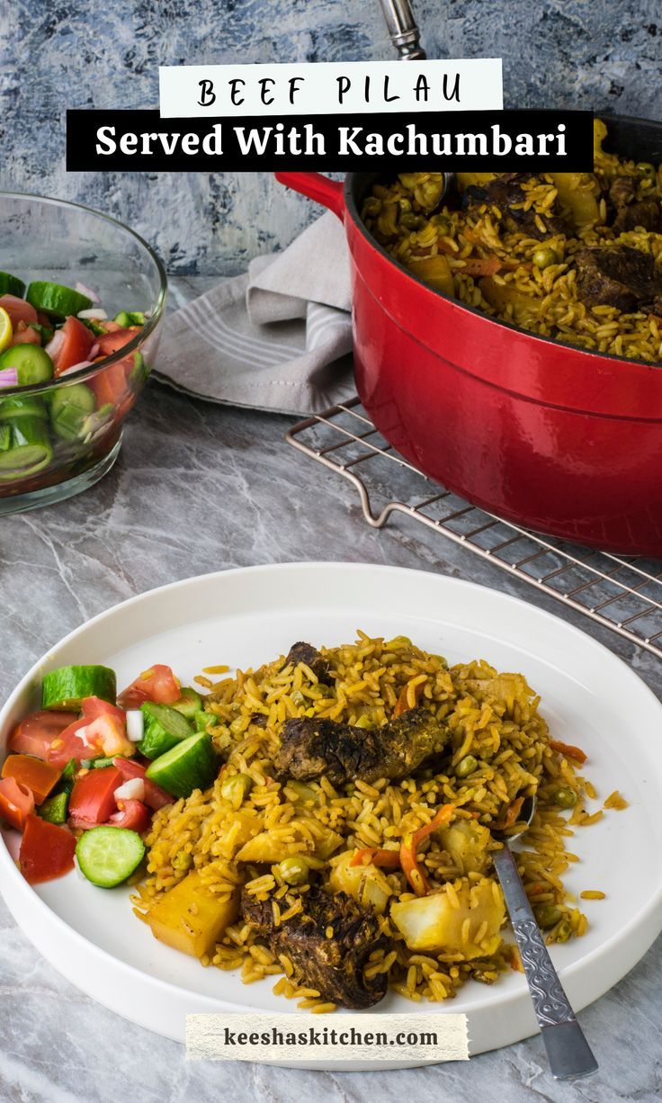 a white plate topped with rice and vegetables next to a red pan filled with food