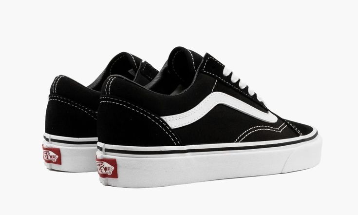 The Vans Old Skool is a timeless canvas-constructed skate shoe.  Universally accepted as one of the most versatile sneaker designs in history, the Old Skool, with its jazzy side stripe, waffle-patterned rubber outsole, and low-profile appearance, comes in an array of colorways.  None, however, have the ubiquitous appeal as this black and white version.  Simplistic yet sturdy black canvas and suede comprise the upper, while a vulcanized white rubber midsole and grippy gum bottom ensure the Vans O White Leather Vans, Vans Old Skool Black, Low Jordan 1, Black White Shoes, Leather Vans, Black And White Vans, Old Skool Black, Yeezy 500, Black And White Shoes