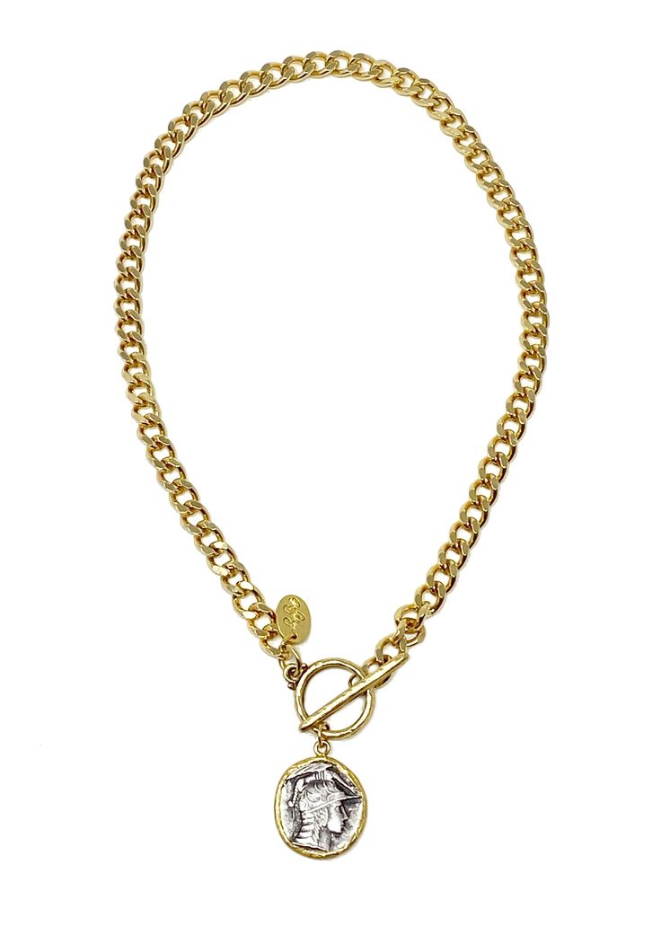 Gold plated brass chain with a beautiful silver coin gold vessel pendant. Perfect to layer with Tyler and Terry necklaces. 15.5" long Gold-tone Medallion Necklace With Coin Pendant, Gold Plated Coin Pendant Necklace, Gold-tone Pendant Medallion Necklace, Metal Medallion Chain Necklace With Adjustable Chain, Metal Medallion Necklace With Adjustable Chain, Adjustable Metal Medallion Chain Necklace, Yellow Gold Metal Pendant Coin Necklace, Yellow Gold Metal Coin Pendant Necklace, Gold Plated Medallion Necklace With Round Pendant