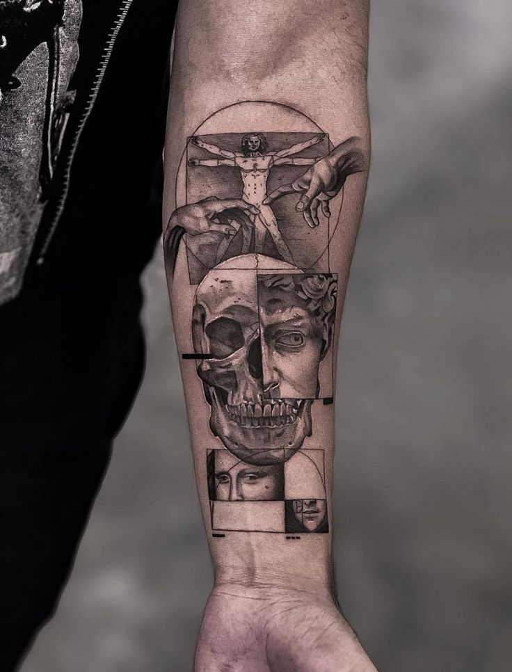 a man with a tattoo on his arm and hand holding a piece of art that is in the shape of a skull