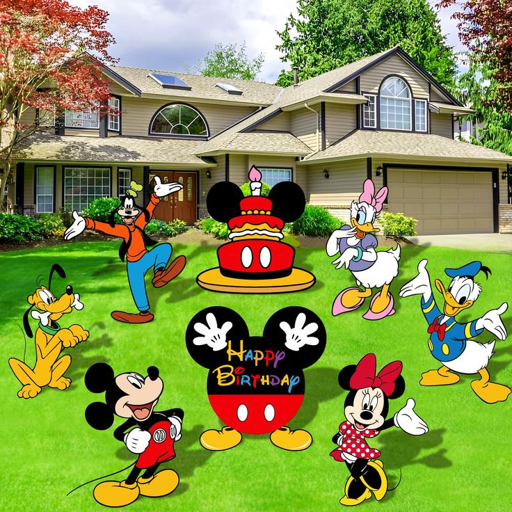 mickey mouse birthday yard decorations in front of a house